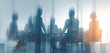 © FauziNh - Blurred image of a business meeting with city lights subtly layered in