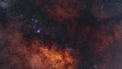 Wall Mural -  Starry sky timelapse background. Beautiful night sky with Milky Way galaxy on dark sky.