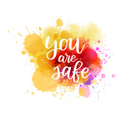 Wall Mural - You are safe - handwritten modern calligraphy inspirational text on pink and purple colored watercolor paint splash. Affirmation message