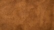 © Arthur - warm brown suede leather texture with soft matte surface and fine natural grain pattern creating an earthy organic background ideal for wallpaper banner design or commercial branding