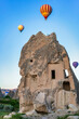 © ADDICTIVE STOCK - Hot air balloons over Cappadocia's fairy chimneys at sunrise