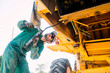 © ADDICTIVE STOCK - Farmer working on agricultural machinery in Spain