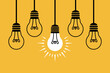 © ilyas_pinda_ala - Illustration of light bulbs hanging with one lit up concept for business idea solution