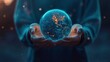 © peerawat - A person holding a glowing, holographic Earth in their hands, symbolizing global connection, environmental care, or digital world.