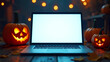 © EPICreation - Mockup of blank white open laptop screen with glowing jack-o'-lanterns on desk, festive orange bokeh lights background - Halloween celebration, advertising, template, display, holiday shopping concept