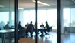 © Hyejin Kang - Group of businesspeople negotiating gathered in modern conference room, blurred silhouettes view, closed glass doors.