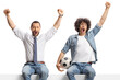 © Ljupco Smokovski - Men cheering and holding a football seated on a blank panel
