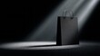 © Daphne - Stylish black shopping bag in dramatic spotlight with elegant design