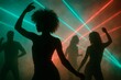 © hobonski - Silhouetted Ravers Dancing Under 90s Neon Laser Beams. Dancers move in silhouette against glowing red and green laser beams at a moody 90s rave.
