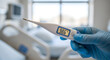 © Karmiyem - Body Temperature Monitoring In Hospital Setting Medical Staff Holding A Digital Thermometer Showing A Normal Reading Health Assessment And Care Patient Wellbeing 180