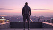 © KENZOGROW - Athleisure wear dominates modern fashion trends. A person stands on a rooftop, gazing at a city skyline during sunset, reflecting tranquility and contemplation.