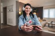 © Jelena - Woman enjoying music with headphones and smartphone at home