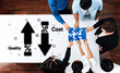 © InfiniteFlow - A top-down view of diverse professionals working together on a puzzle, symbolizing the balance between quality and cost in business strategies and teamwork. Trope