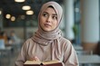 © Abdullah - The Thoughtful Student – Close-Up Portrait of a Pensive University Girl in Hijab with Textbook
