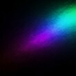 ©  mdadibuzzaman007 - A diagonal beam of vibrant light, transitioning from deep red to purple, blue, cyan, and green, illuminates a dark background with a textured effect.