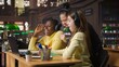 © DC Studio - Young students and tutor attending an online class via video call in the library, focused on distance learning and completing a school assignment with other classmates on the network. Camera A.