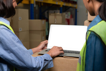 Wall Mural - Computer with green screen display in warehouse storage room . Delivery and transportation software concept .