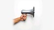 © firman - Hand holding gray megaphone isolated on clean white background