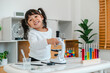 © geargodz - happy toddler girl scientist learning science with microscope