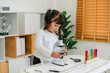 © geargodz - toddler girl scientist placing microscope slides with specimen. learning science