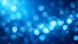 © Ghulam - Abstract Blue Background with Sparkling Bokeh Light Effect for Holiday Celebrations