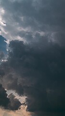 Wall Mural - Timelapse Dark Blue Cloudy Rainy Sky. Rain Heavy Clouds Give Way To White Fluffy Clouds. Sky Natural Background. Cumulonimbus Clouds. Weather Forecast. Enlightenment Concept. From Dark To Light