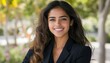© Ilja - Confident Hispanic Businesswoman with Stunning Appearance, Radiating Professionalism and Ambition