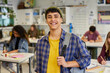 © Rido - Portrait of smiling student guy at high school