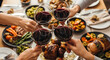 © Sulfabndi - Festive Dinner Celebration A Toast to Good Times Together with Red Wine Sharing Delicious Meal Enjoying Friendship Creating Memories Connecting Through Food and Drink