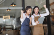 © crizzystudio - Women entrepreneurs celebrating success in new business