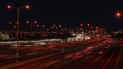 Wall Mural - Nighttime timelapse of busy Hwy 401 in Ontario, Canada with bright lights