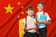 © New Africa - Children with backpacks and notebooks against flag of China. Language school