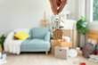 © Shisu_ka - Moving house, relocation. Man hold key house keychain in new apartment. move in new home. Buy or rent real estate. flat tenancy, leasehold property, new landlord, investment, dwelling, loan, mortgage.