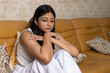 © Pix4Ads - Indian young woman feels unhappy, suffering from insomnia, sad and disappointment about problem in personal life. Depression or unexpected pregnancy and having problems sleeping