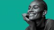 © Konstiantyn Zap - Smiling african female with braided hair and earrings against teal background