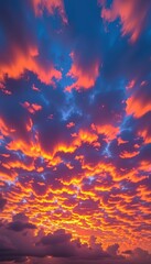 Wall Mural - Vibrant sunset sky ablaze with colorful clouds, fiery oranges, pinks, and purples painted across the twilight canvas, clouds, golden hour