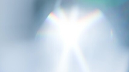 Wall Mural - Sunshine in a Thick Prism. Loop. The light passes through the facets of a slowly rotating diamond and creates repetitive sparkling highlights and rainbow colors