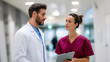 © Sergio IQstock - Doctor consulting nurse in corridor of modern hospital, teamwork and patient care concept doctor consulting nurse, modern hospital corridor, teamwork in medicine, patient care disc