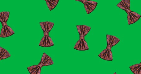 Wall Mural - Digital animation of multiple bow tie icons falling against copy space on transparent background