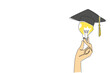 © Simple Line - Single one line drawing hand holding a bulb on top of which is a graduation cap. A symbol of the desire to achieve the highest education. Holding Bulb. Continuous line design graphic illustration