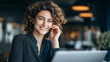 © Kateryna - Cheerful smiling female professional reviewing business strategies on laptop during video conference call in modern office video call meeting remote meeting participation