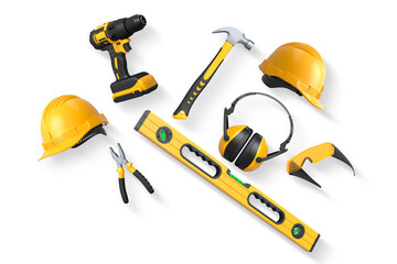 Construction tools and safety equipment shown on white background. Concept of work safety and building tools