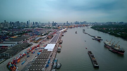 Wall Mural - Drone timelapse BKK Port in Bangkok, Thailand. Cargo ships on Chao Phraya River