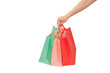 © Pornprasit Panada - Hand holding shopping bags isolated on transparent.