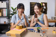© Washburn - Two young women selling products online