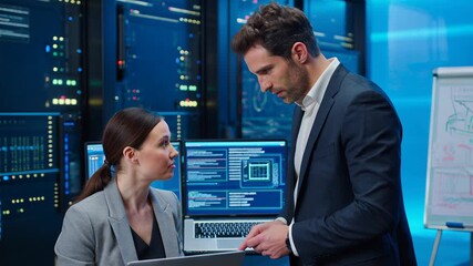 Dynamic tech team collaborating on data analysis in modern server room environment, professional feel