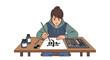 © il - Woman practicing Chinese calligraphy with brush and ink on a wooden table.