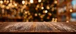© Ksenia - The rustic wooden table with festive bokeh background during a holiday celebration.