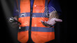 © PRIM - 'A construction worker holding a phone with floating digital icons above. The image highlights the integration of technology in construction, focusing on tools, safety, and monitoring systems.