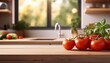 © FREDCassandra - blurred kitchen background with fresh tomatoes and modern decor for website background or marketing material